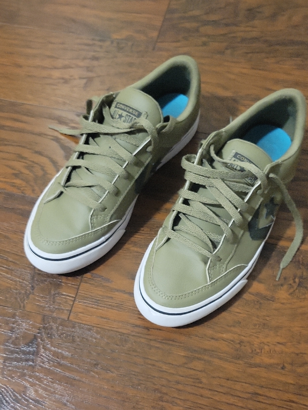 Converse Low-Top Sneakers in Olive Green with White Soles